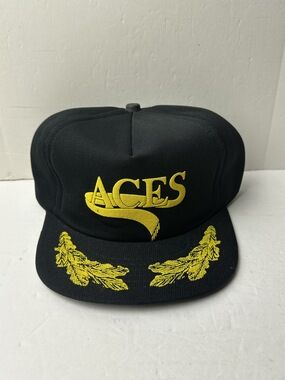 Vtg 80s Aces black snapback cap with gold embroidery and green underbrim